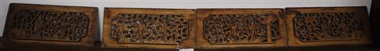 A set of four Chinese carved wood panels